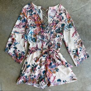 BLUSH Floral Romper w/ Lace-Up Back
